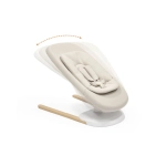 Hamaca Yoga de Stokke en movimiento con flecha curva que indica el balanceo hacia los lados.