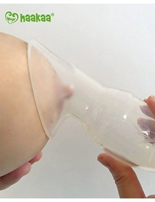Utilzando el Recolector Leche Haakaa con base succión en el pecho