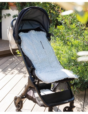 Colchoneta Little Bloom de Pasito a Pasito colocada en silla de paseo