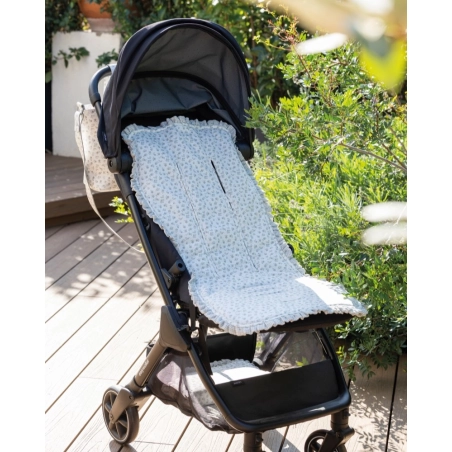 Colchoneta Little Bloom de Pasito a Pasito colocada en silla de paseo