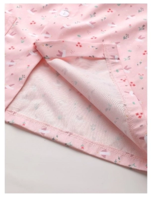 Babi con botones Impermeable Blossom Birds de Tutete