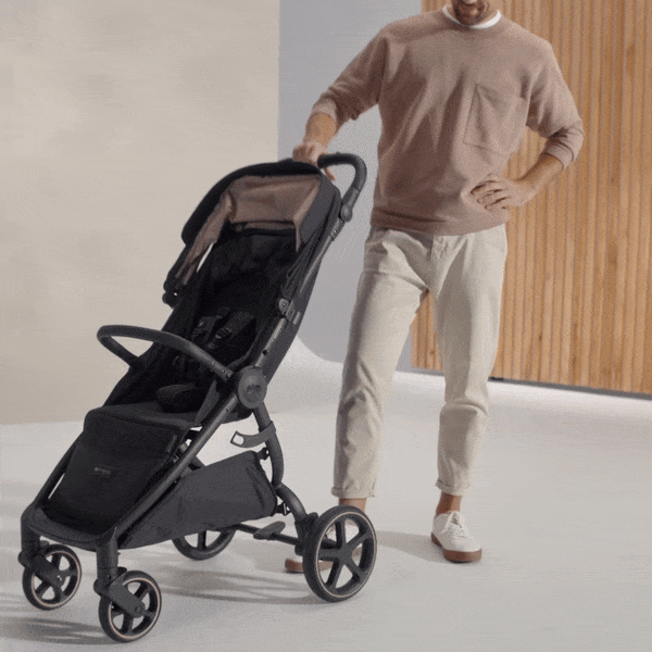 Plegado de la silla de paseo Mitzy de Kinderkraft Plegado de la silla de paseo Mitzy de Kinderkraft